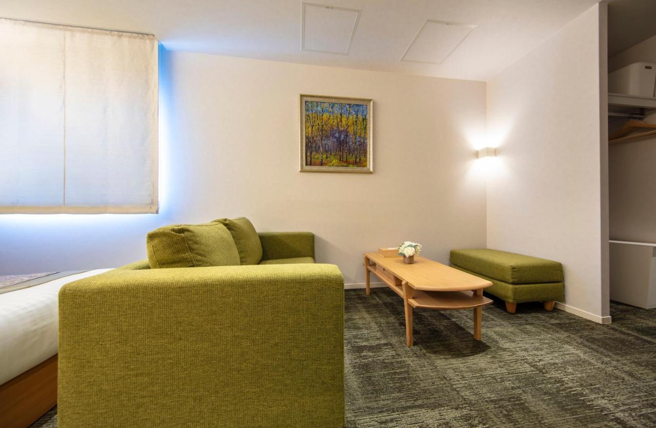 Aparthotel Grand Base Okayama Ekimae Exterior foto