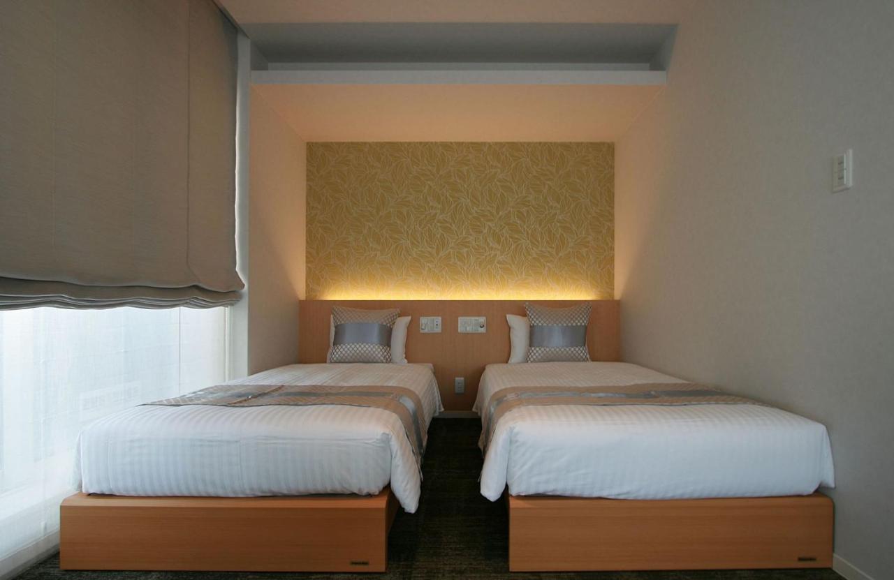Aparthotel Grand Base Okayama Ekimae Exterior foto
