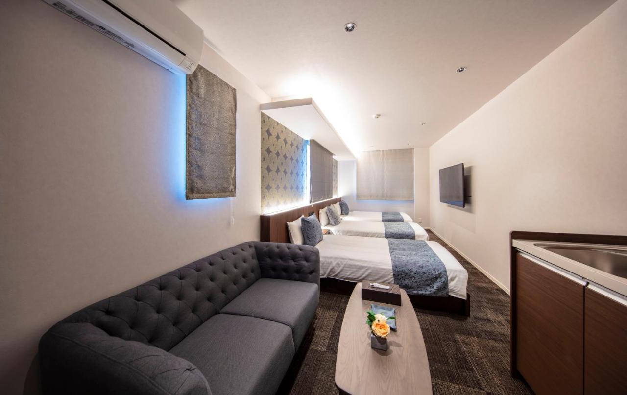 Aparthotel Grand Base Okayama Ekimae Exterior foto