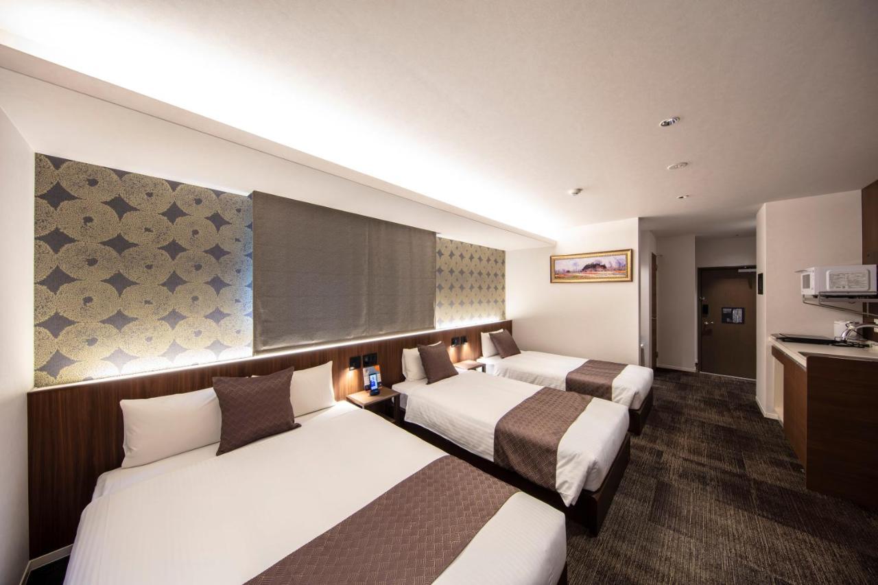 Aparthotel Grand Base Okayama Ekimae Exterior foto