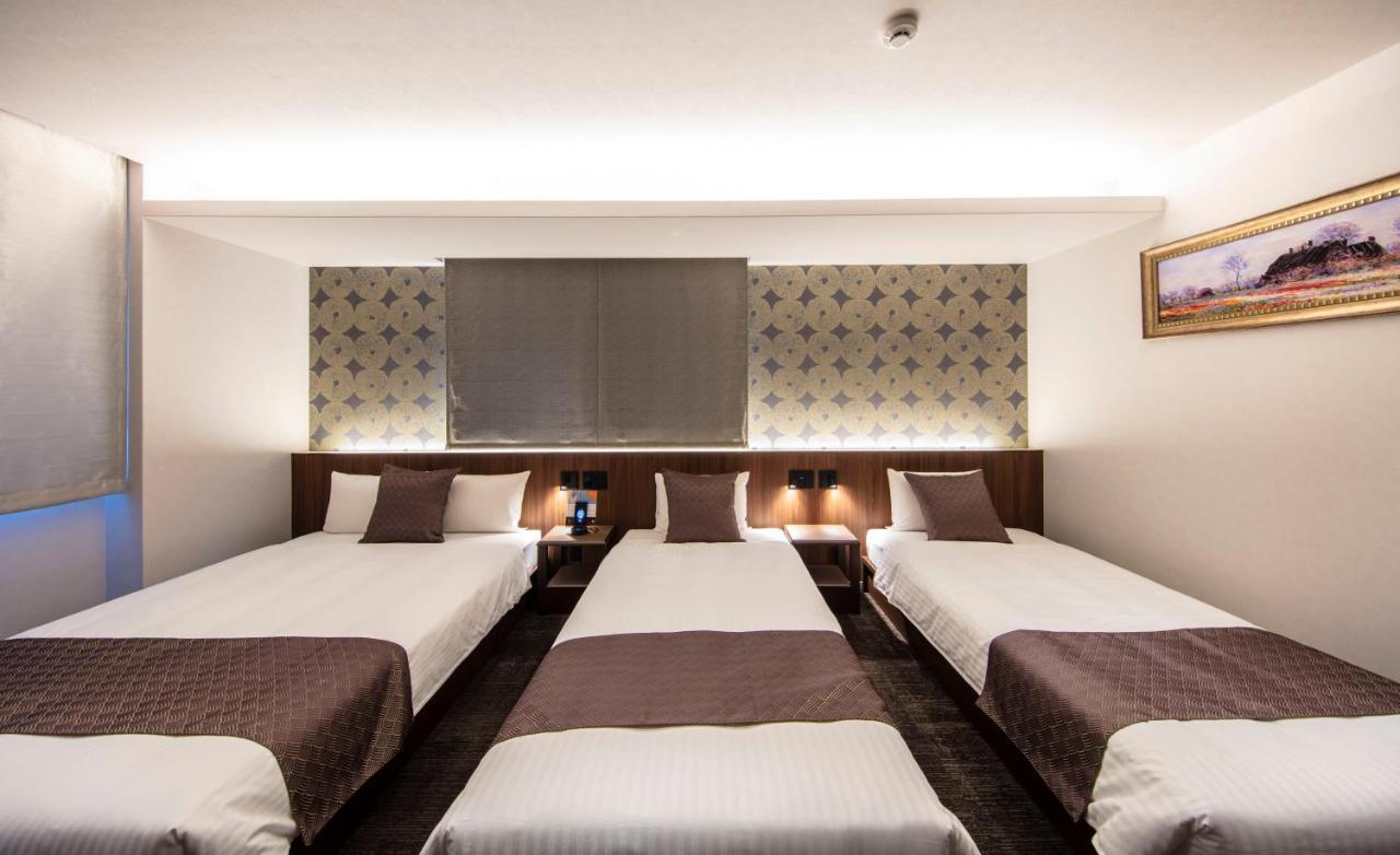 Aparthotel Grand Base Okayama Ekimae Exterior foto