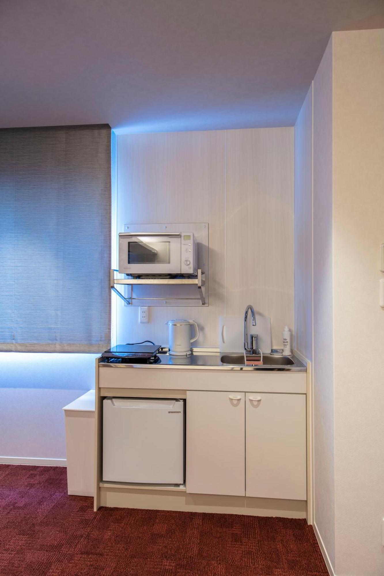 Aparthotel Grand Base Okayama Ekimae Exterior foto